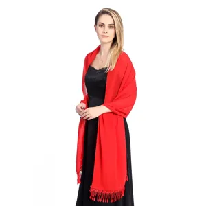 Detailed view of elegant red chiffon shawl with tassel fringe, perfect for evening wear events.