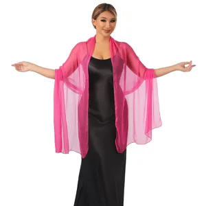 Close-up detail of the vibrant pink sheer shawl, showcasing lightweight shimmering fabric and elegant drape.