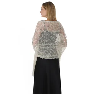 Detail view of elegant sequin embroidered evening shawl wrap for women wedding dress accessory.