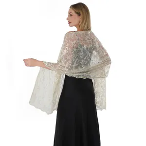 Detailed view of the elegant sequin embroidered evening shawl and wedding wrap for women.
