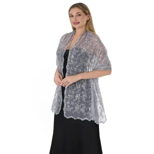 Close up view of the elegant grey sequin lace shawl, showing intricate embroidery details.