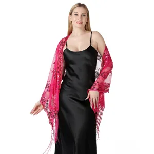 Detailed view of the pink sequin embroidered evening shawl with delicate fringe, perfect for parties.