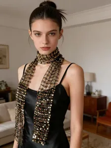 Detailed close-up of a trendy black mesh sequin scarf sparkling fashionable neck accessory.