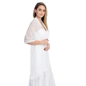 Detailed view of a white chiffon shawl featuring delicate lace fringe trim and elegant drape.