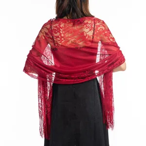 Red lace hollow shawl detail, elegant evening dress accessory with delicate tassel fringe.