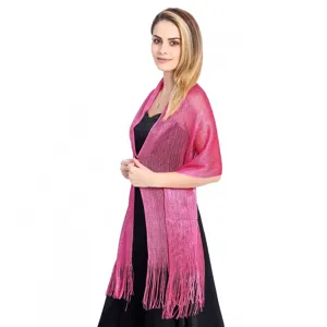Close-up detail of the shimmering metallic pink fringe shawl for evening party wear.