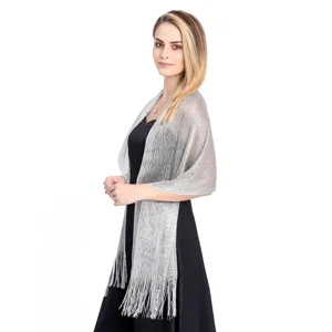 Elegant metallic silver shimmering fringed shawl wrap for evening parties and bridal gowns.