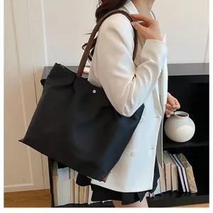 Casual oxford cloth shoulder bag for women, large capacity stylish tote for daily commute.