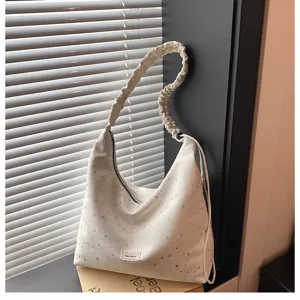 Detailed view of the sweet star printed hobo shoulder bag with scrunchie strap and large capacity.