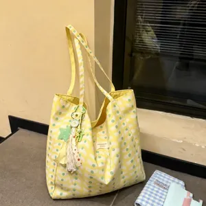 Large capacity canvas tote bag with wave pattern, versatile casual shoulder bag for daily commuting.