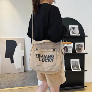Large capacity canvas shoulder crossbody tote bag for women stylish student school book bag.
