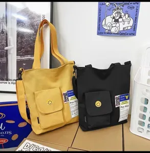 Canvas shoulder messenger bag, large capacity fashion tote bag with exterior pocket.