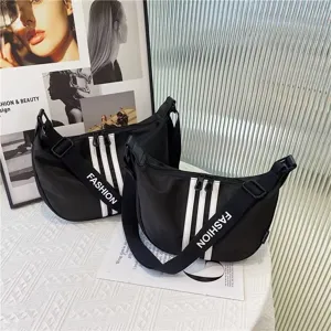 Black oxford cloth crossbody bag for women, large capacity casual dumpling handbag with stylish stripes.