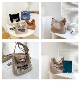 Large capacity canvas shoulder tote bag, stylish Korean style daily casual messenger bag.