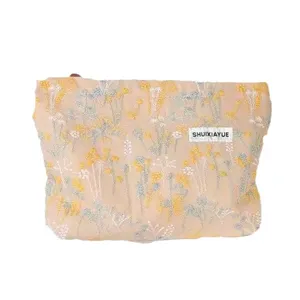 Vintage aesthetic floral embroidered cosmetic bag, portable makeup pouch for women and girls.
