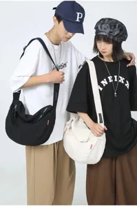 Casual canvas shoulder bag for women, retro dumpling crossbody bag, student daily commuting.