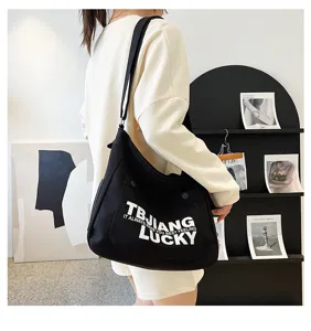 Black canvas shoulder bag, large capacity tote, casual Korean style crossbody bag for women.