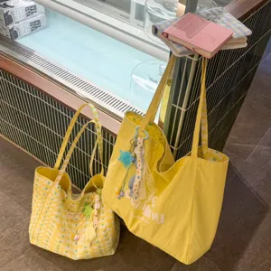 Spacious double-sided canvas tote bag featuring a trendy wavy pattern for daily casual use.