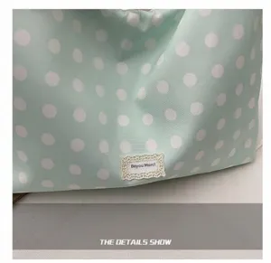 Korean style polka dot canvas tote bag, casual large capacity shoulder bag for daily commute.