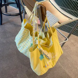 Large capacity yellow canvas tote bag, double-sided wave pattern casual shoulder handbag.