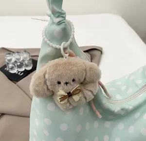 Korean style canvas tote bag with cute plush dog pendant, large capacity casual shoulder bag.