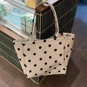 Casual white polka dot canvas tote bag, large capacity daily shoulder bag for women.