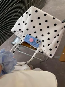 White polka dot canvas tote bag, casual large capacity shoulder bag for daily commute.