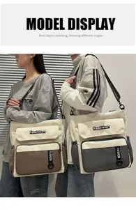 Detail view of large capacity canvas shoulder bag showing multi pockets practical design