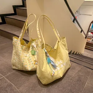 Casual canvas tote bag, large capacity, double-sided wavy pattern, stylish shoulder bag for daily commute.