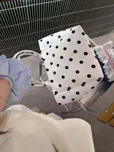 White polka dot canvas tote bag, casual large capacity shoulder bag for daily commute.