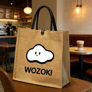 Large capacity jute tote bag with cute cartoon print, casual linen handbag for daily work or shopping.