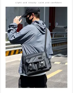 Men's casual waterproof crossbody messenger bag large capacity for business travel.