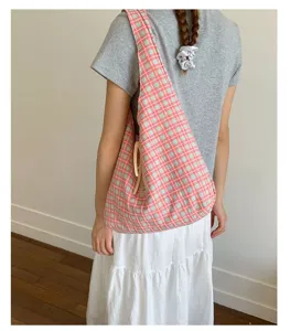 Detailed view of the Japanese style plaid canvas shoulder bag, large capacity daily use.
