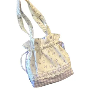 Cute purple floral plaid drawstring bag for women, stylish shoulder crossbody bag for summer.