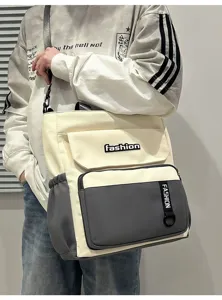 Casual two-tone canvas shoulder bag detail showcasing large capacity and stylish design.
