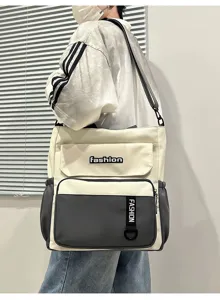 Large capacity color-block canvas shoulder bag for casual daily use and students.