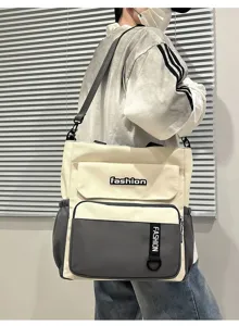 Large capacity versatile canvas shoulder crossbody bag with multi pockets and contrast color design.