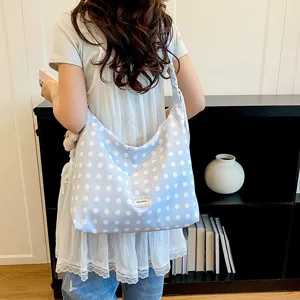 Casual canvas tote bag with polka dot pattern, large capacity shoulder bag for daily commute.