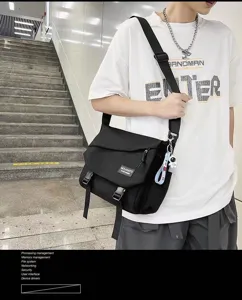 Canvas messenger bag for men and women, stylish casual shoulder crossbody bag for daily commute.