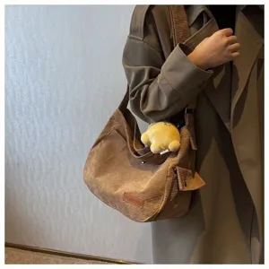 Brown corduroy shoulder bag for women, large capacity casual tote bag for autumn and winter commute.