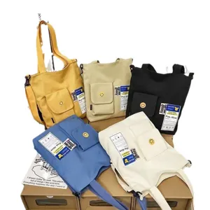 Casual canvas tote bag with large capacity, stylish shoulder and crossbody bag for men daily use.