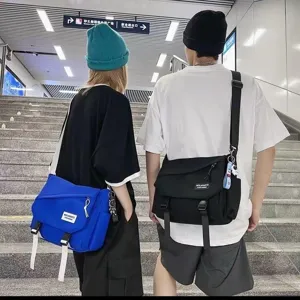 Casual canvas messenger bag for students, stylish commuter shoulder bag daily use.