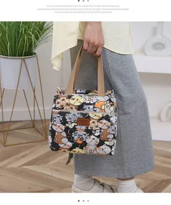 Thickened canvas lunch bag with cute cat print, portable bento handbag for daily use.
