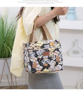 Thickened canvas lunch bag with cute cat print, stylish handbag for women and office workers.