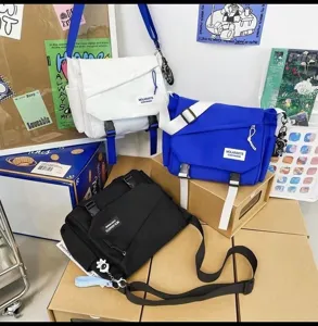 Casual canvas messenger bag for daily commute, trendy student shoulder backpack with multi pockets.