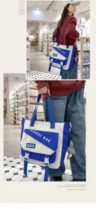 Grand sac bandoulière en toile pour étudiants, cabas élégant et coloré pour le quotidien.