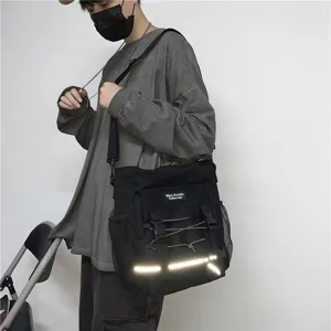Lässige schwarze Canvas-Umhängetasche mit mehreren Fächern, Retro-Stil, ideal für Studenten.