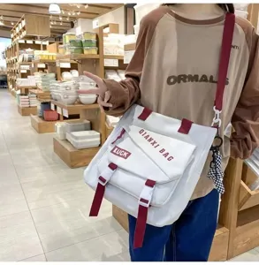 Grand sac bandouliere en toile impermeable pour femmes, sac d'ecole elegant.