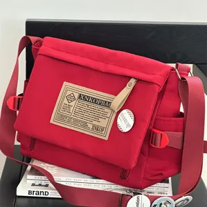 Casual large capacity red canvas messenger bag, Japanese retro vintage crossbody bag for students.