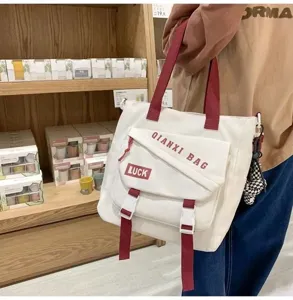 Grand sac bandoulière en toile pour femme, sac fourre-tout élégant pour étudiante avec rabat.